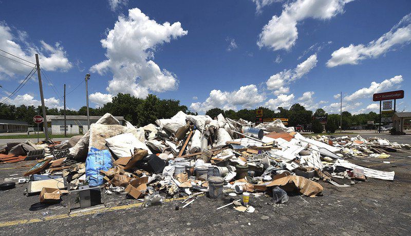 Retreating floodwaters reveal major damage in Miami
